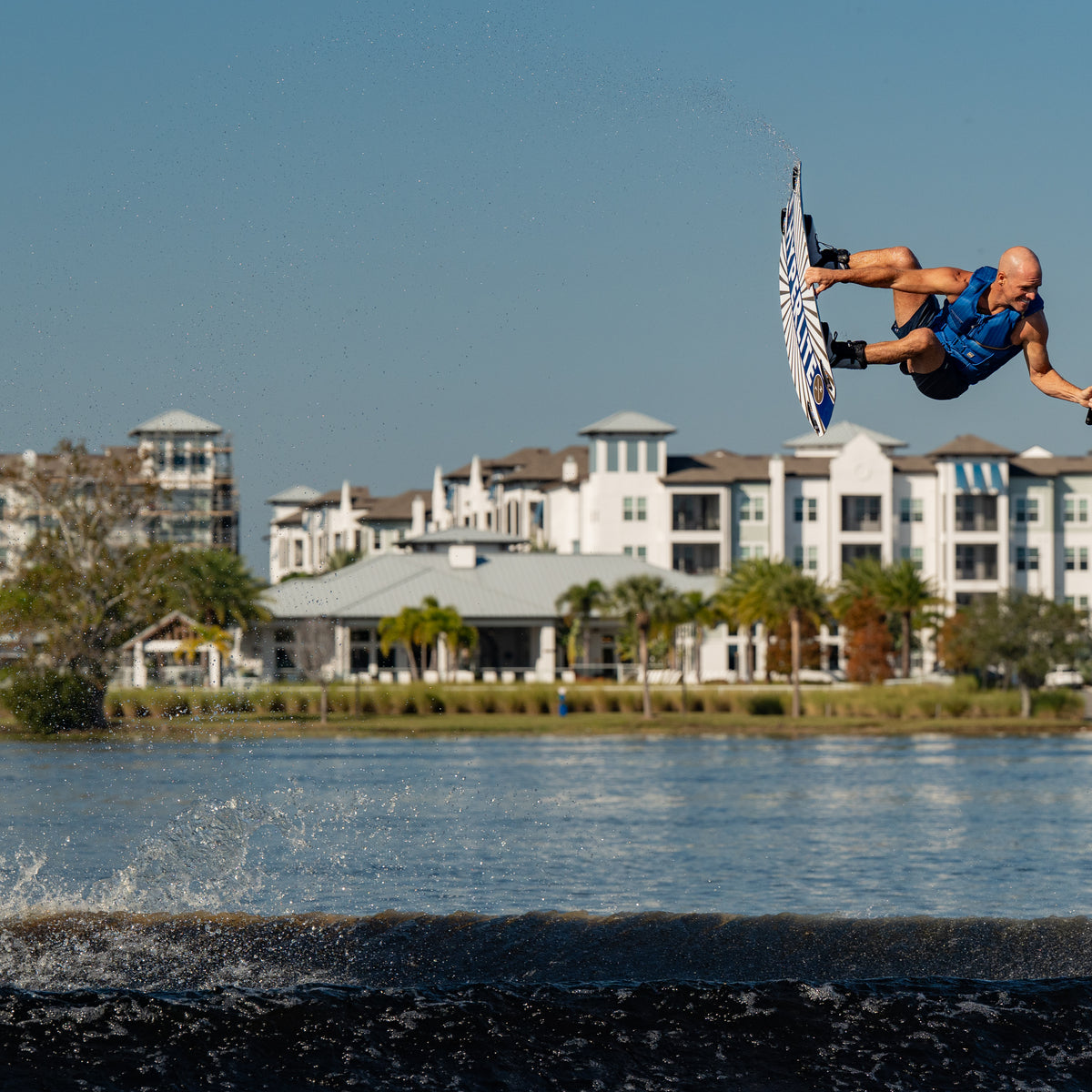 Shaun Murray wakeboarding in the new 2026 Jetpilot Murray vest. #color_navy
