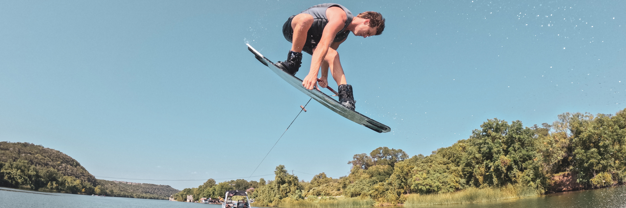 JB O'Neill wakeboarding wearing his signature vest