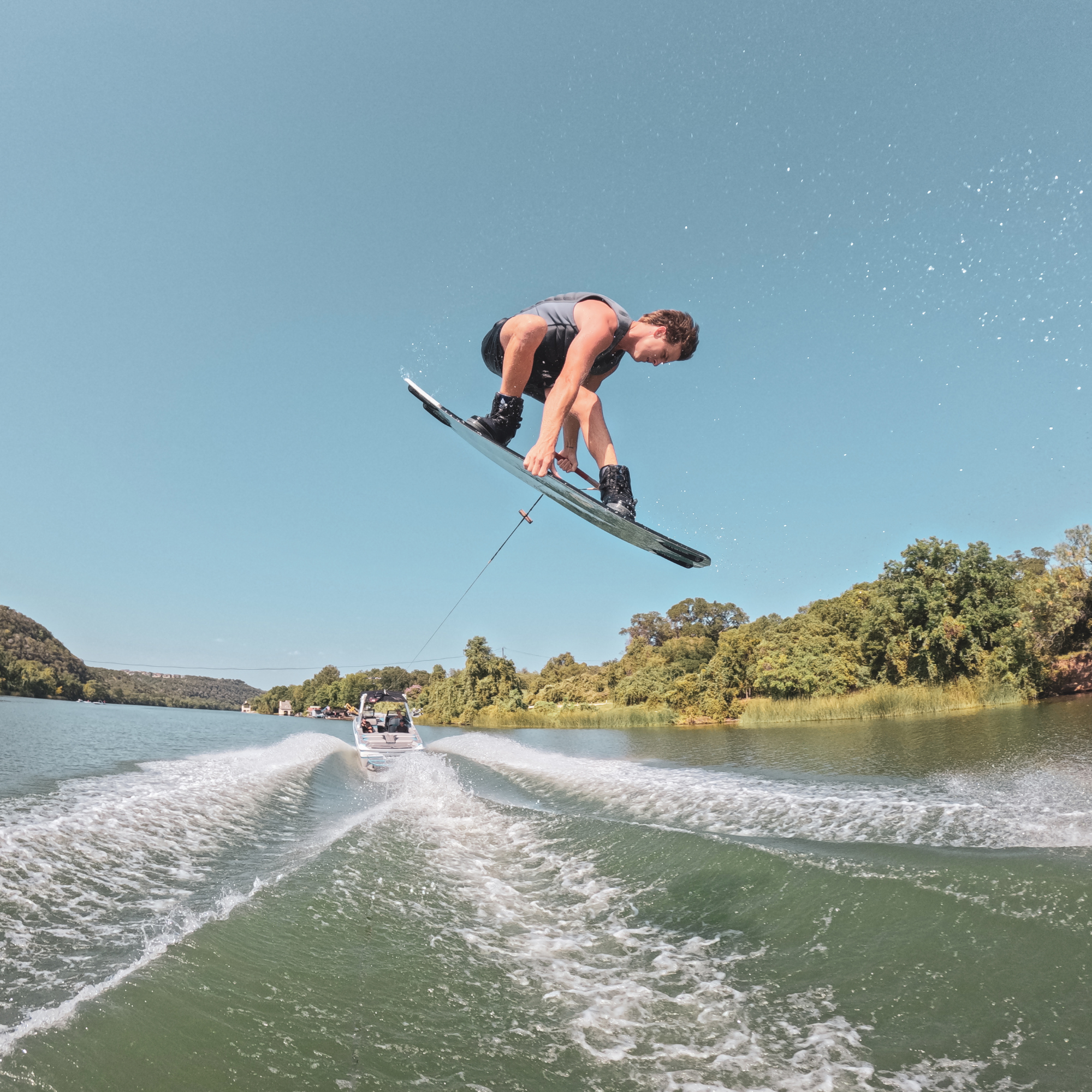 JB O'Neill wakeboarding wearing his signature vest