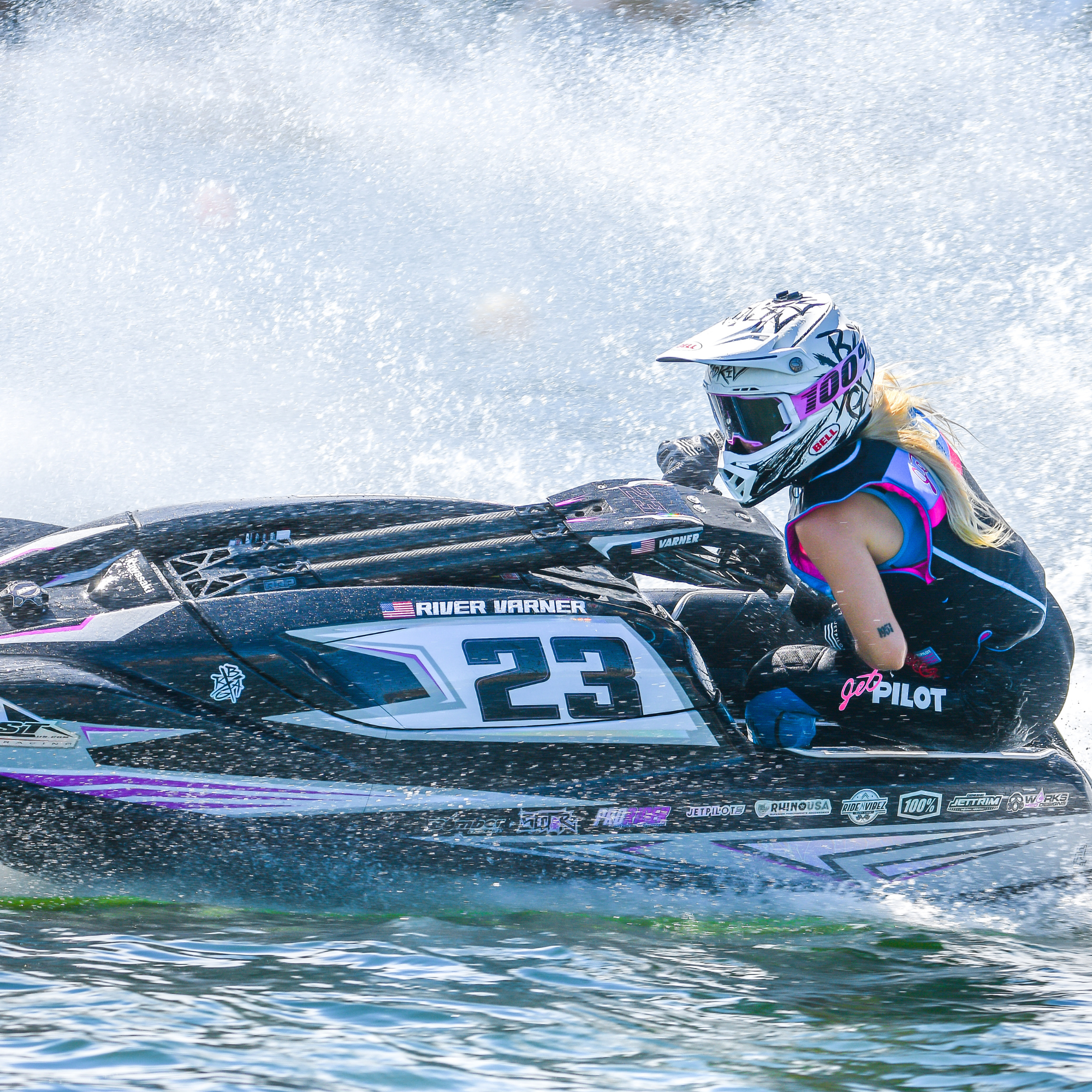 Jetpilot team rider wearing the Vintage Class John and Nylon vest.