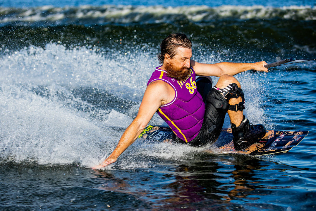 Image of Shane Bonifay wakeboarding. #color_gold-purple