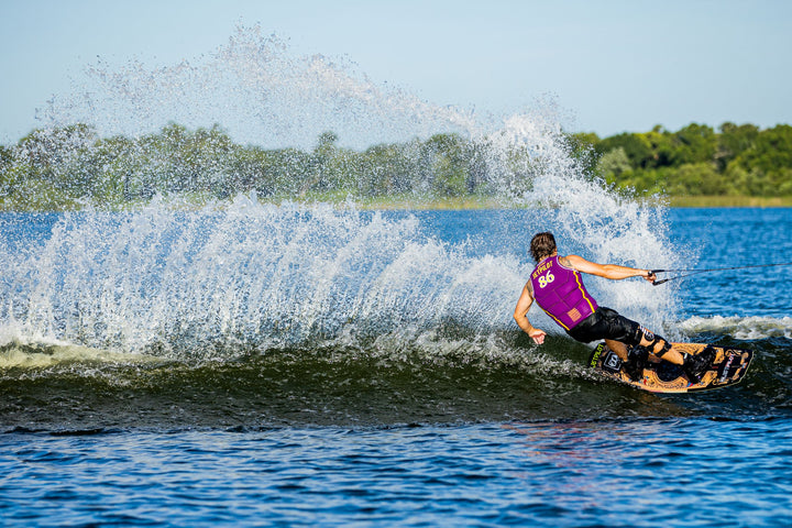 Image of Shane Bonifay wakeboarding. #color_gold-purple