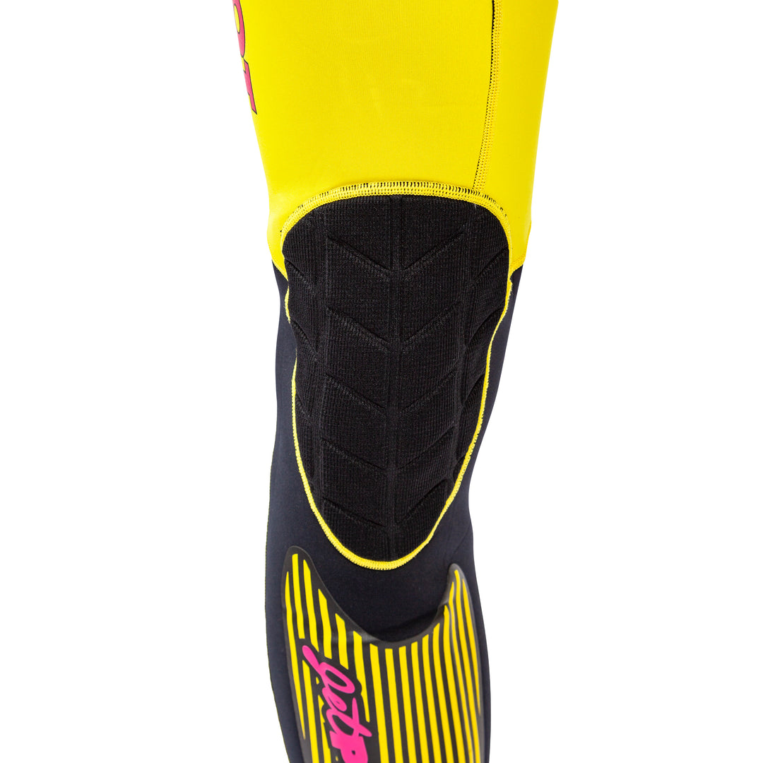 View of the Jetpilot Vintage John Wetsuit Yellow Black colorway knee pad.
