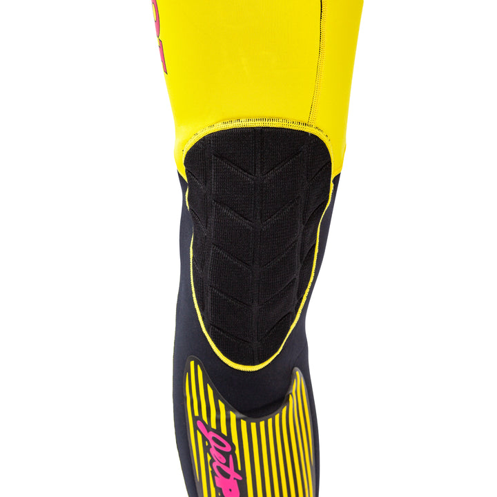View of the Jetpilot Vintage John Wetsuit Yellow Black colorway knee pad.
