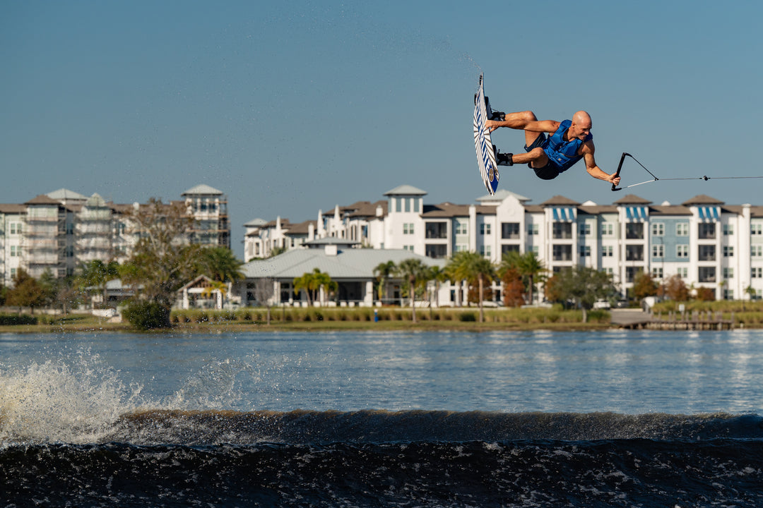 Shaun Murray wakeboarding in the new 2026 Jetpilot Murray vest. #color_navy