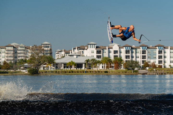 Shaun Murray wakeboarding in the new 2026 Jetpilot Murray vest. #color_navy