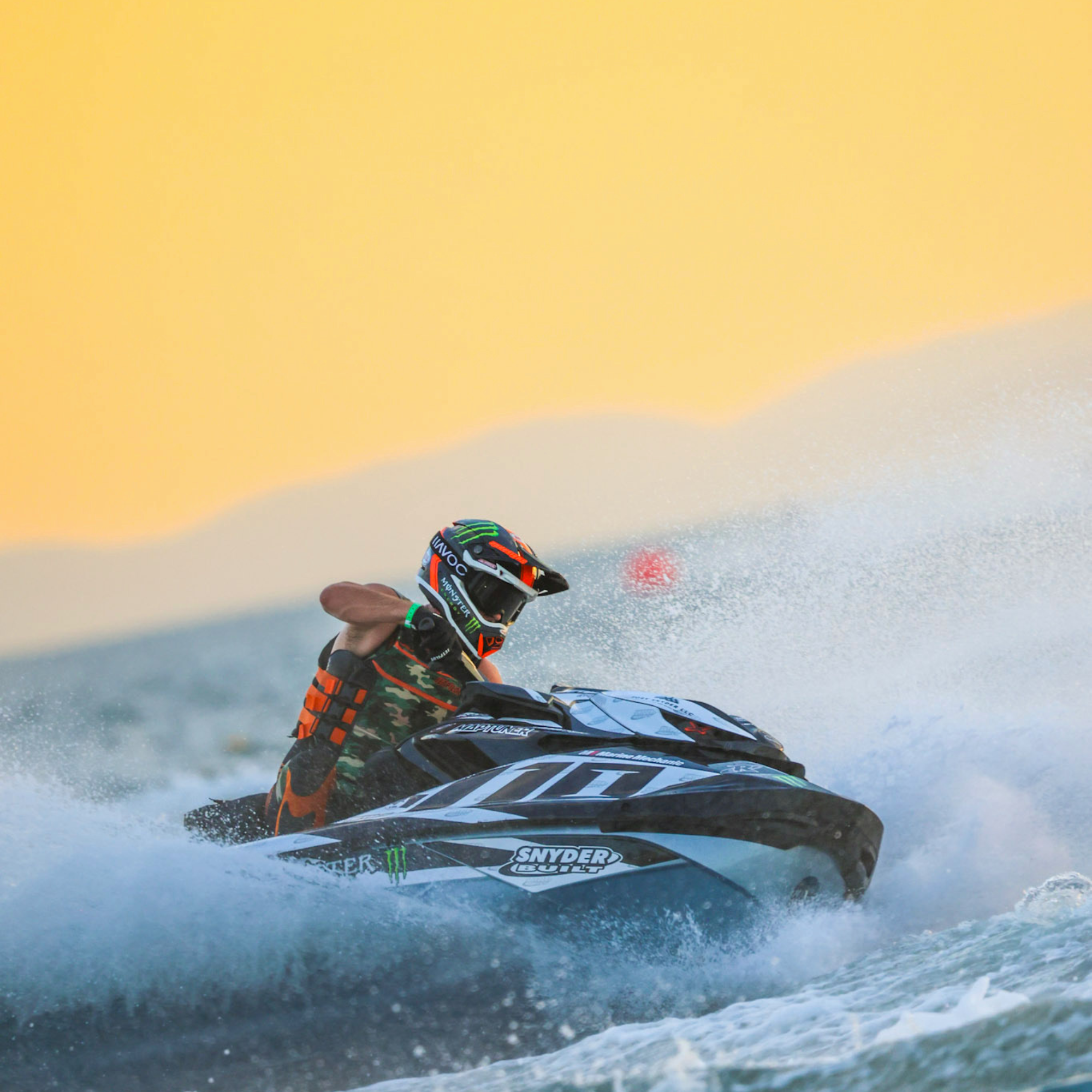 Jetpilot team rider wearing the Camo Sabre John Wetsuit.