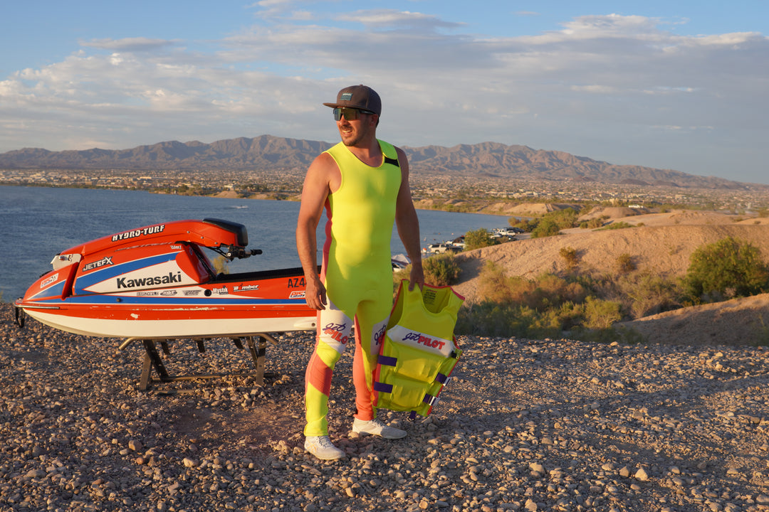Jetpilot team rider Mark Gomez wearing the Vintage Class Racer John. #color_neon-pink