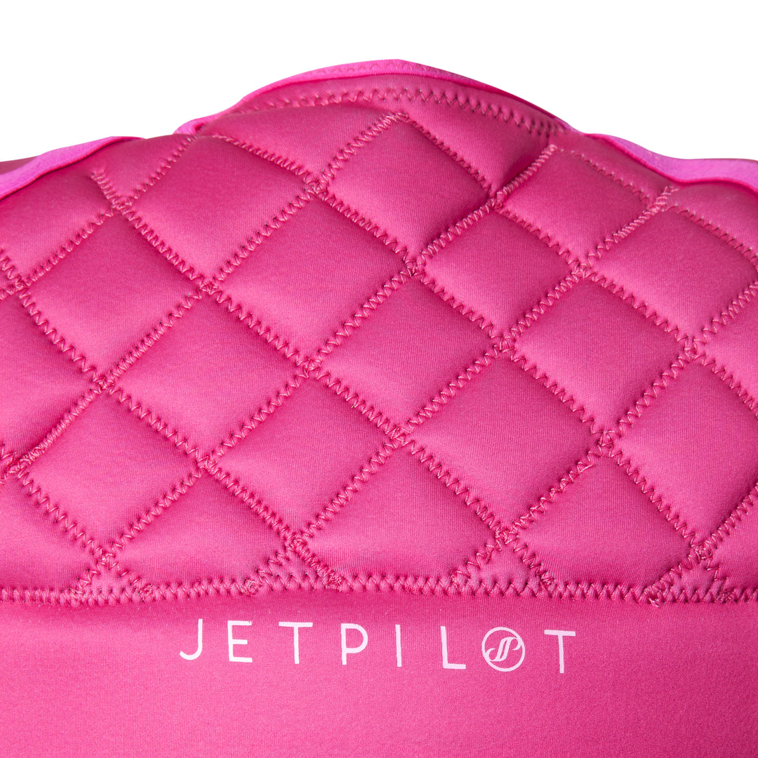 Rear top view outside of the Wave Farer comp vest in the color pink showing the protection pattern