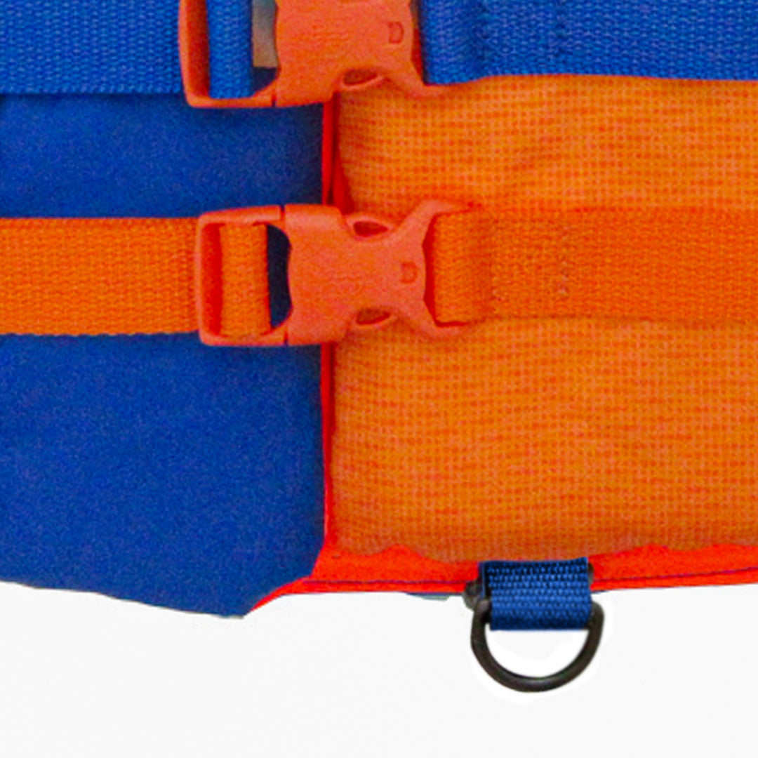 Front  bottom view of the youth Jetpilot Pistol CGA vest Orange Blue showing the D ring