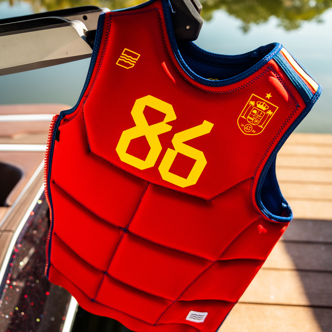 View of the Jetpilot Baller Comp vest hanging from a boat. 