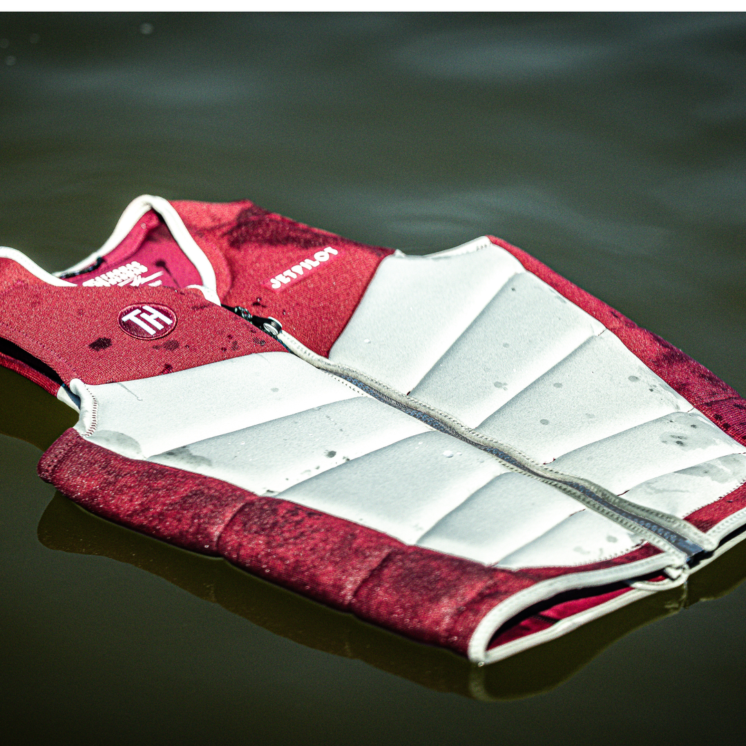 Thomas Herman Jetpilot vest floating in water.