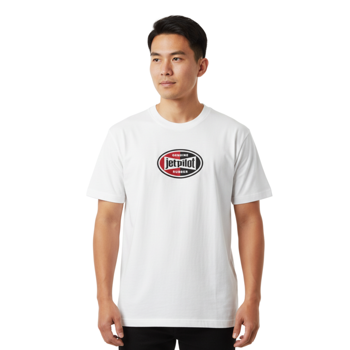 A guy wearing a white Jetpilot t-shirt with a big Jetpilot logo.