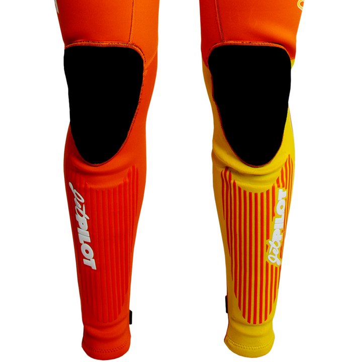 View of the Jetpilot Vintage John Wetsuit Orange White colorway knee pads.