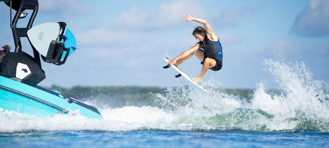 Image of Dylan Ayala airing of a wake with his pro model board.