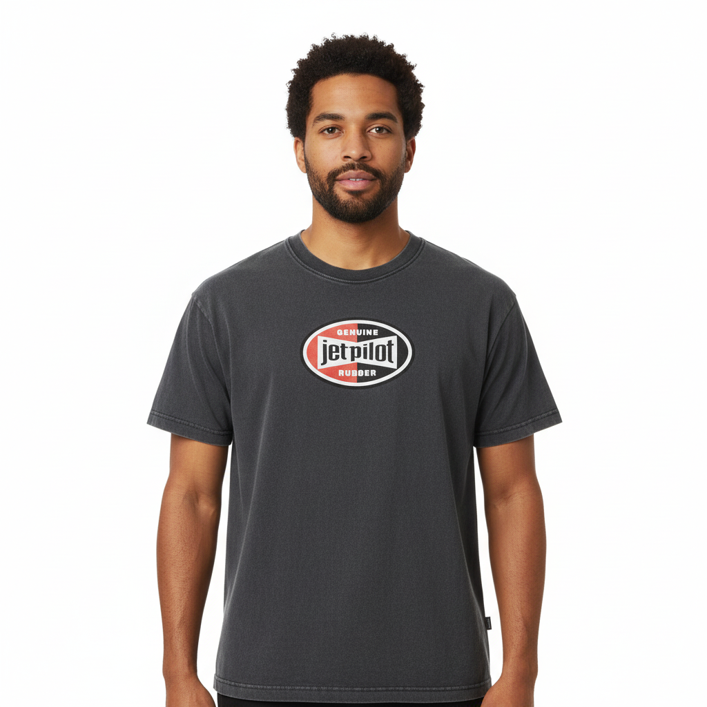 A guy wearing a black Jetpilot t-shirt with a big Jetpilot logo.