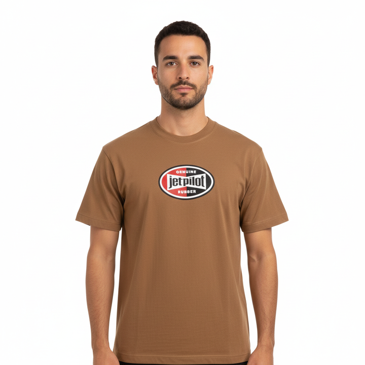 A guy wearing a brown Jetpilot t-shirt with a big Jetpilot logo.