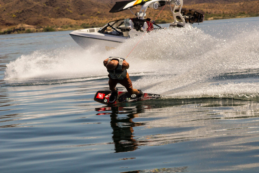 Picture of Shaun Murray wakeboarding on glassy water.