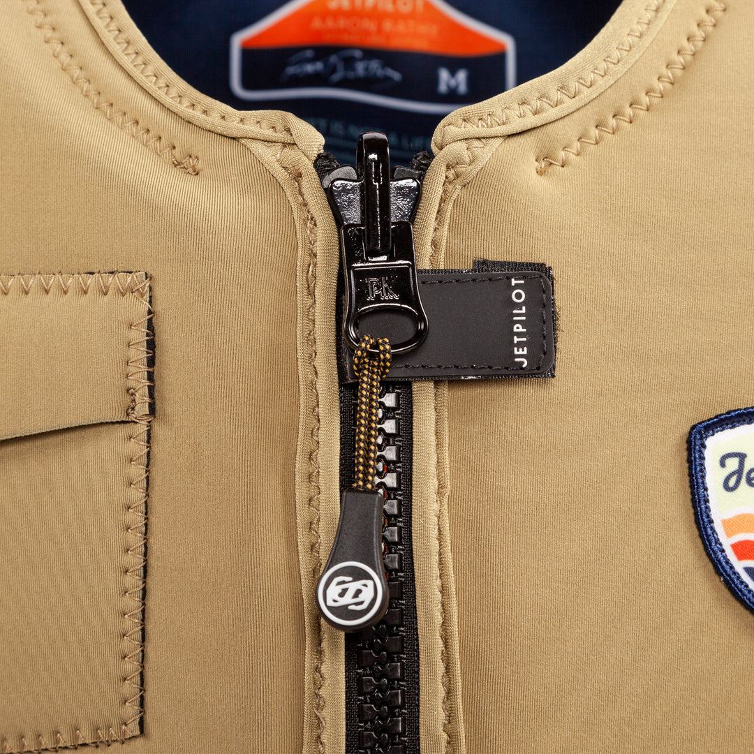 Closeup view showing zipper of the Aaron Rathy of the Jetpilot's Aaron Rathy Signature Comp Vest Sand colorway.